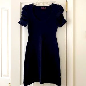 Black “Take Out” dress. Simple style can be dressed up/down. Good condition.